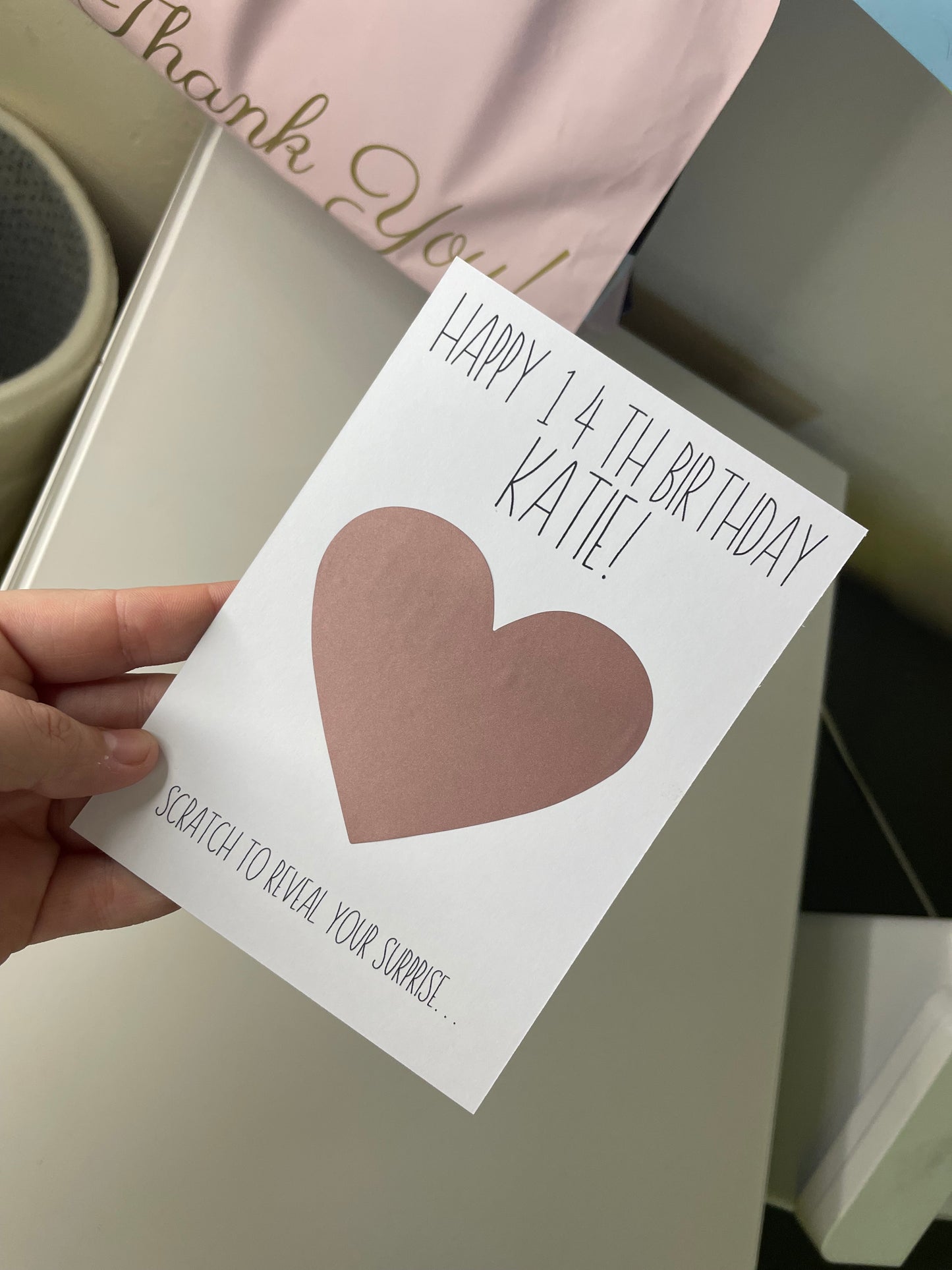 Scratch to reveal card