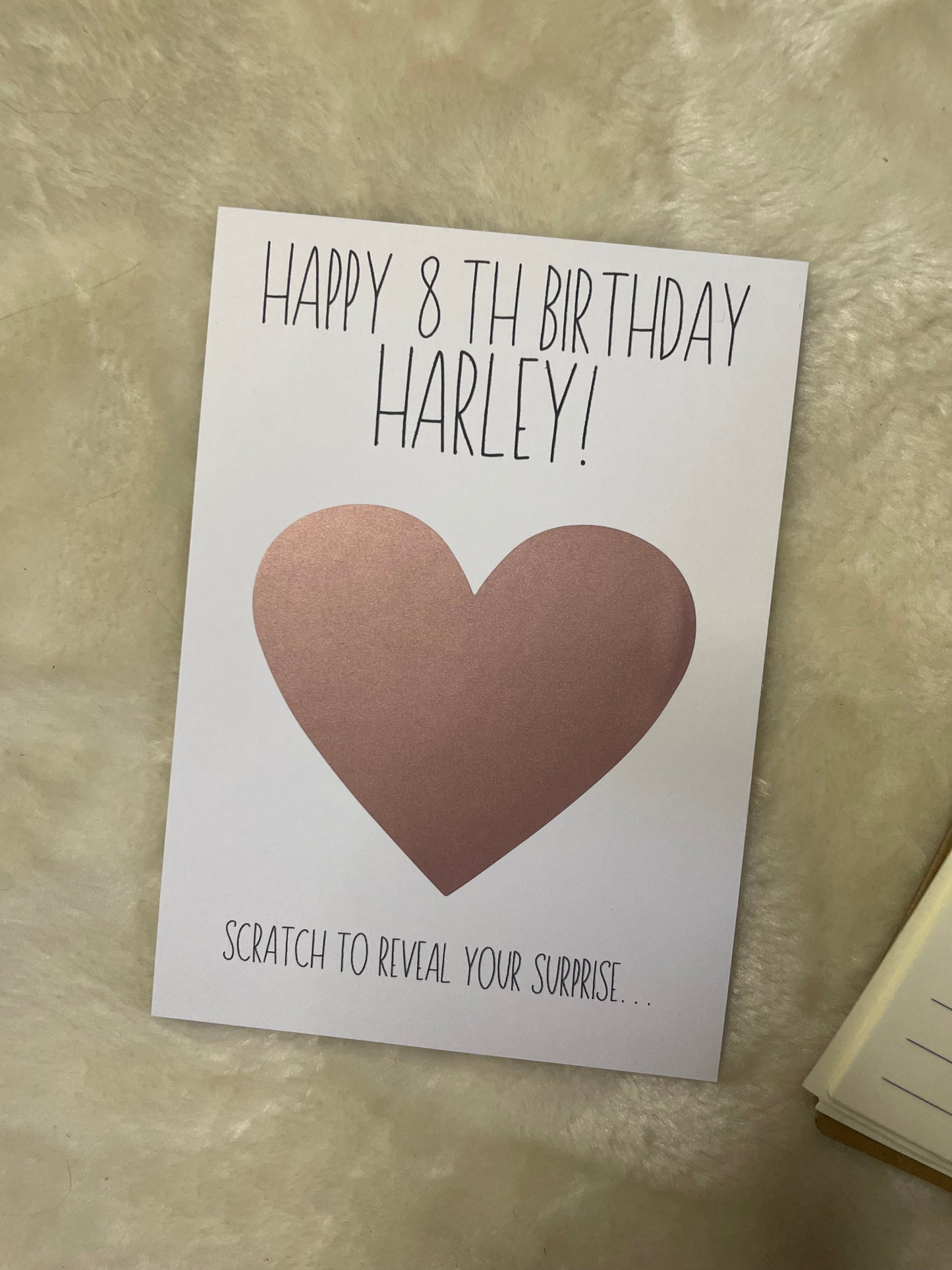 Scratch to reveal card